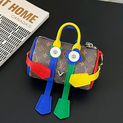 Key holder and ornament for decorating the Mister Keepall bag